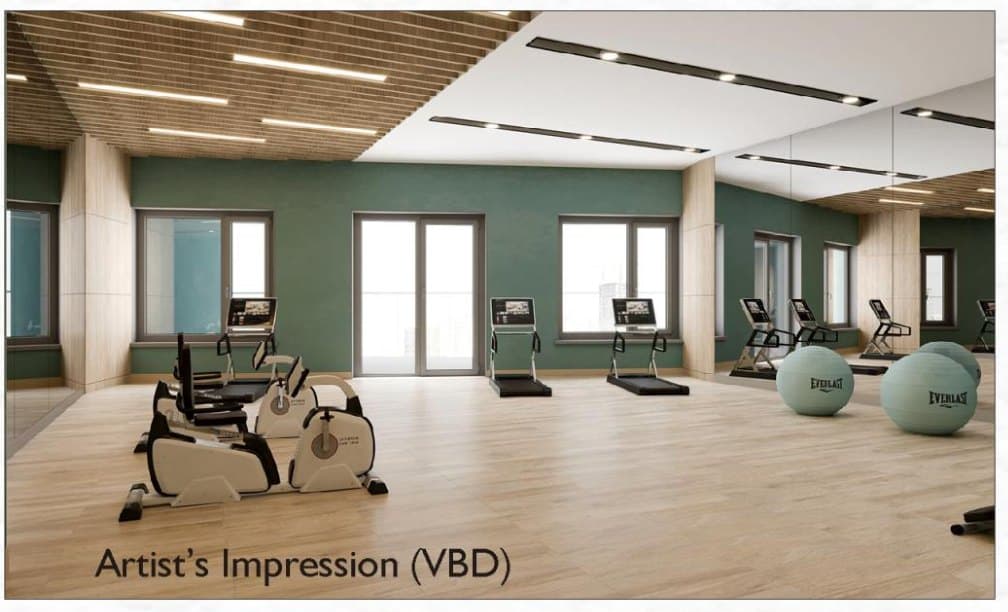 The gym, third view: exercise bikes and balance balls on the timber floor