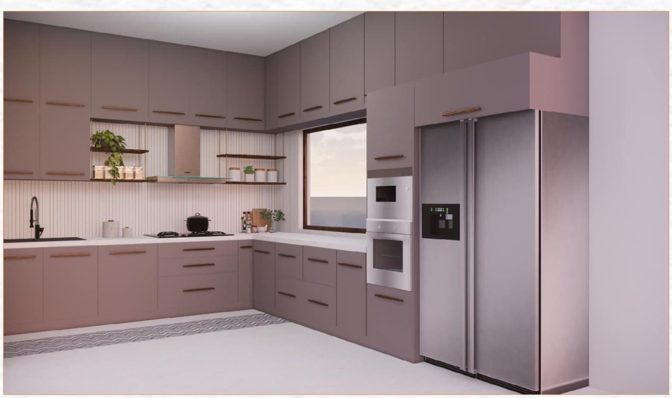 A fitted kitchen in dusty pink with a tall fridge and a window over the counter
