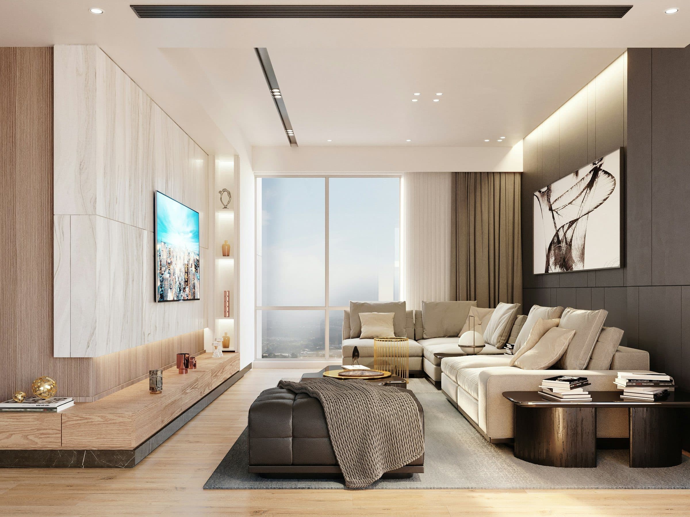 A finished contemporary living room, a cream sectional sofa before a wood and stone panelled wall washed with warm cove light