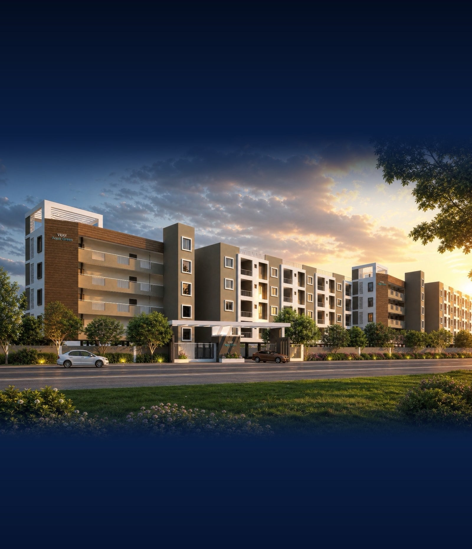 Vijay Aqua Green at sunset, its low blocks running back along the road behind a planted verge